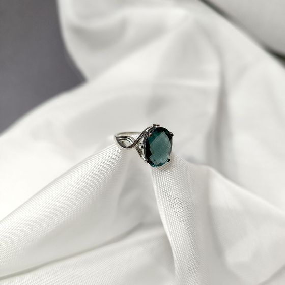 Серебряное кольцо с топазом Лондон Блю 5.043ct, фианитами