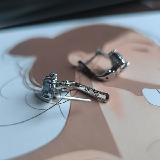 Серебряные серьги с мистик топазом 3.951ct