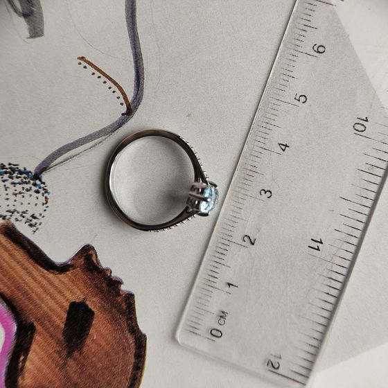 Серебряное кольцо с топазом 1.402ct, фианитами