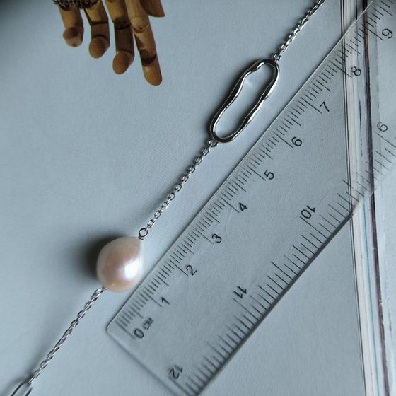 Серебряное колье с жемчугом барочным