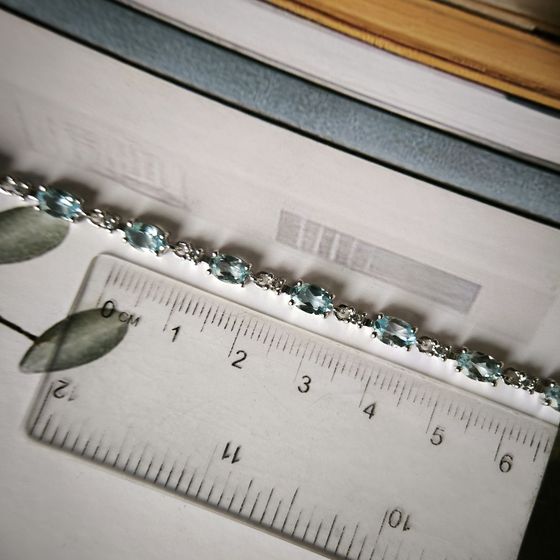 Серебряный браслет с топазом 7.775ct, фианитами