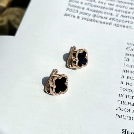 Золотые серьги с ониксом