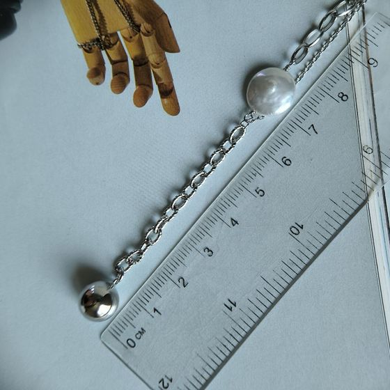 Серебряное колье с жемчугом барочным