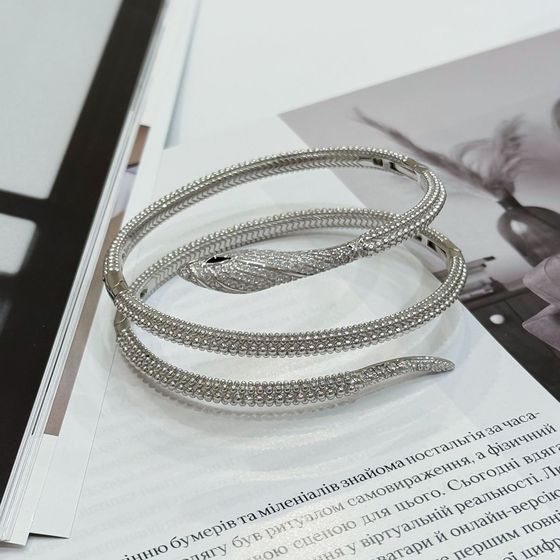 Серебряный браслет с фианитами, емаллю