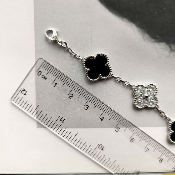 Серебряный браслет с ониксом, фианитами