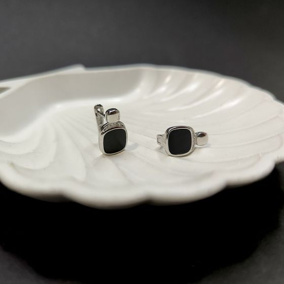 Серебряные серьги с ониксом